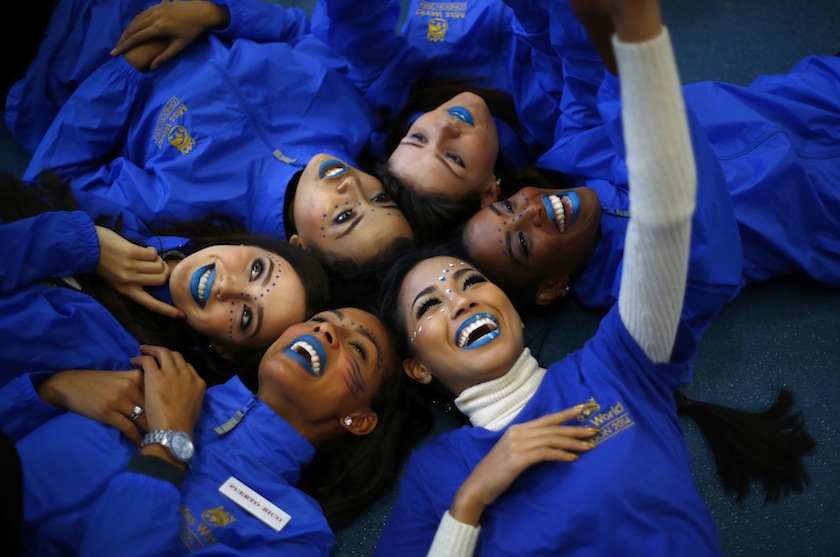 Miss Thailand Maya Nonthawan Thongleng takes a selfie with other contestants during the Miss World sports competition at the Lee Valley sports complex in north London, November 26, 2014. u00e2u20acu201du00c2u00a0Reuters pic