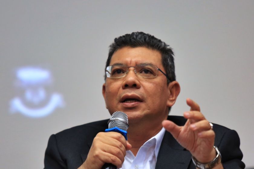 Datuk Saifuddin Abdullah speaks at the u00e2u20acu02dcFreedom of Expression: A Tool for Harmonisation or Polarisationu00e2u20acu2122 forum at Universiti Malaya, December 12, 2014. u00e2u20acu201d Picture by Saw Siow Feng