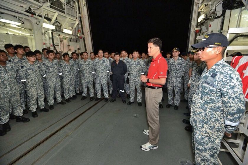 Second Minister for Defence Chan Chun Sing speaks with Republic of Singapore Navy (RSN) servicemen on board RSS Supreme before departing for Indonesia to take part in the search and locate (SAL) operation for missing AirAsia flight QZ8501. u00e2u20acu2022 AFP pic
