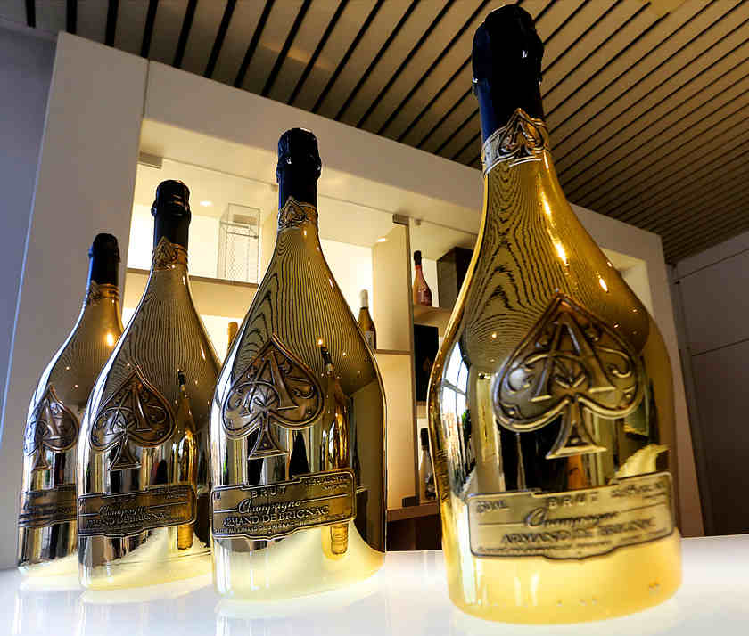 Golden bottles of 'Armand de Brignac' Champagne bearing an ace-of-spades insignia made popular and famous by rapper Jay Z. u00e2u20acu201d AFP pic