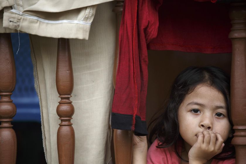 A girl looks on at a disaster evacuation centre after being evacuated due to flooding, at Tumpat in Kelantan December 30, 2014. u00e2u20acu201d Reuters pic