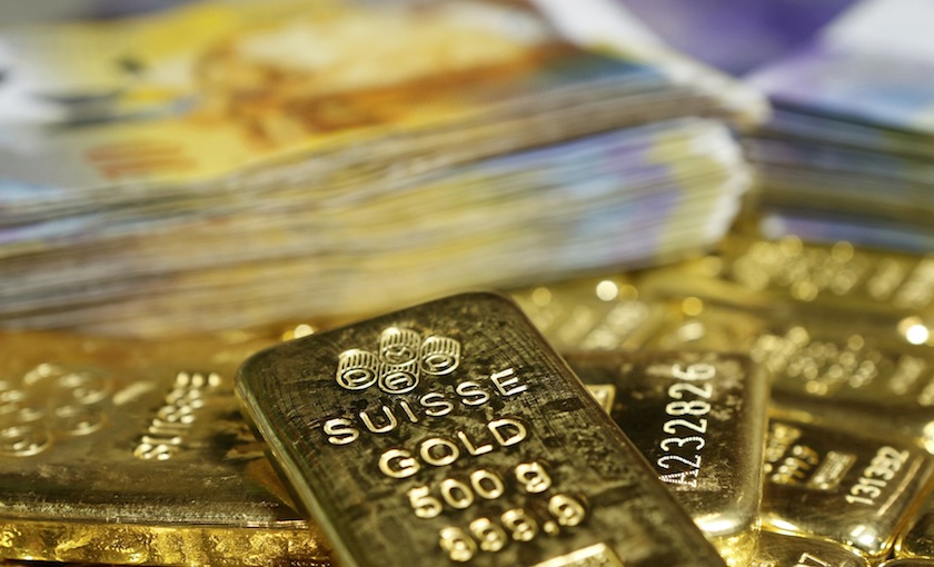 Gold bars and Swiss Franc banknotes are seen in this illustration picture taken at the GSA in Vienna November 13, 2014. u00e2u20acu201d Reuters pic