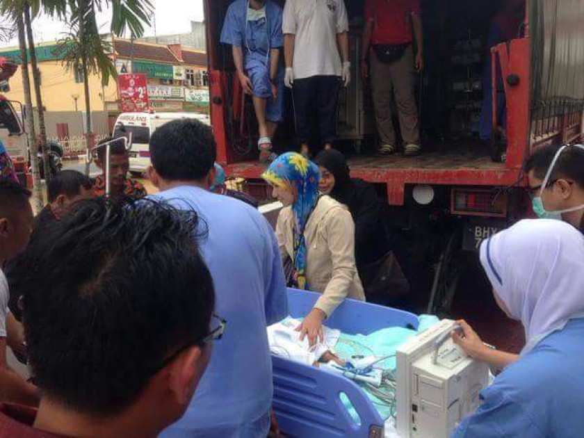 Picture released December 28, 2014 shows a three-month old baby in an incubator being evacuated to Hospital Universiti Sains Malaysia (HUSM). u00e2u20acu201d Picture courtesy of Health Ministry's Facebook page.