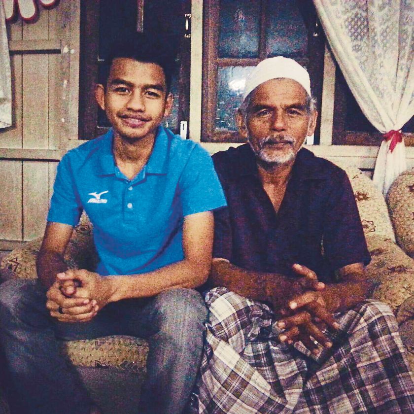 National walker Muhammed Khairil Harith Harun (left) remains clueless of his father, Harunu00e2u20acu2122s well-being after floods hit Pasir Mas recently. u00e2u20acu2022 Malay Mail pic