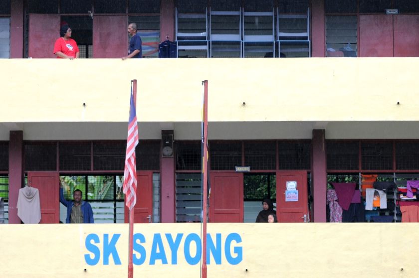 Victims of flooding in Sayong are temporarily placed in SK Sayong, one of the flood relief centres in Kuala Kangsar, Perak. December 26, 2014. u00e2u20acu201d Picture by K.E. Ooi