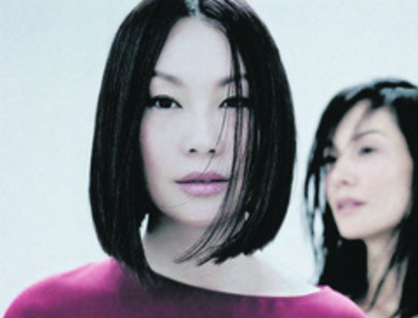 One of Singapore's former top models, Lum May Yee, is featured in the Elle x ION calendar. u00e2u20acu201d TODAY pic