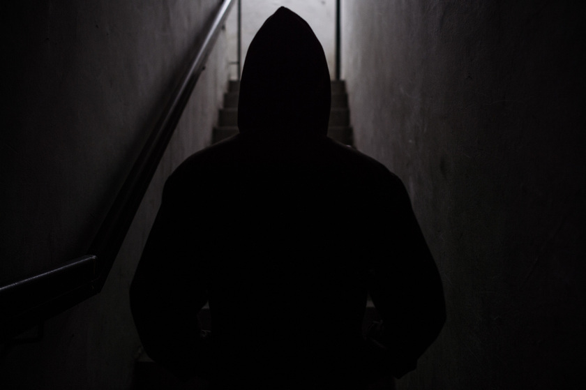 In this photo taken on November 27, 2014 a Nepalese worker using the pseudonym 'Manu' walks towards a stairwell in Telok Panglima Garang, outside Kuala Lumpur. u00e2u20acu201d AFP pic