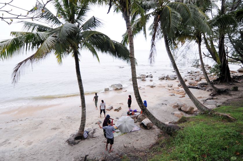 Picnickers at Miami Beach, Batu Ferringhi, where many were killed 10 years ago when tsunami hit the shores here on Boxing day.