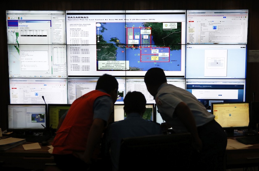 Authorities monitor progress in the search for AirAsia Flight QZ8501 in the Mission Control Center inside the National Search and Rescue Agency in Jakarta  December 29, 2014. u00e2u20acu201du00c2u00a0Reuters pic