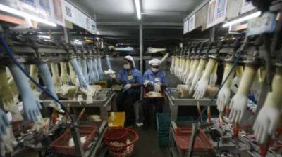 Malaysian SME generic - Klang glove factory Reuters