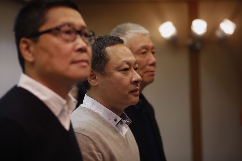 Occupy Central civil disobedience founder Benny Tai (centre), along with co-founders Chan Kin-man (left), and Reverend Chu Yiu-ming, hold a news conference on their voluntary surrender to the police in Hong Kong December 2, 2014. u00e2u20acu201d Reuters pic