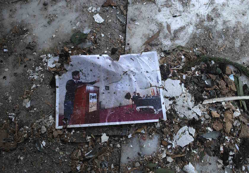 A photograph lies on the auditorium floor of the Army Public School, which was attacked by Pakistan Taliban gunmen, in Peshawar December 18, 2014. u00e2u20acu201d Reuters pic