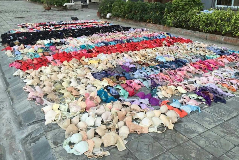 Hundreds of stolen women's underwear are placed on the ground after being found hidden in the ceiling of a apartment building, in Yulin, Guangxi Zhuang Autonomous Region, December 19, 2014.u00c2u00a0u00e2u20acu201d Reuters pic