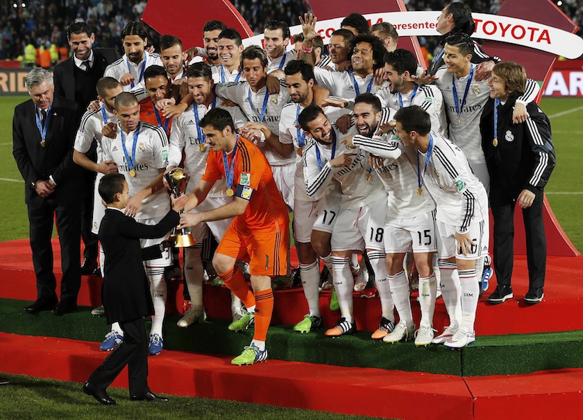 Morocco's Prince Moulay Hassan presents the trophy after Real Madrid won the Club World Cup final match against San Lorenzo at Marrakesh stadium December 20, 2014.u00c2u00a0u00e2u20acu201d Reuters pic