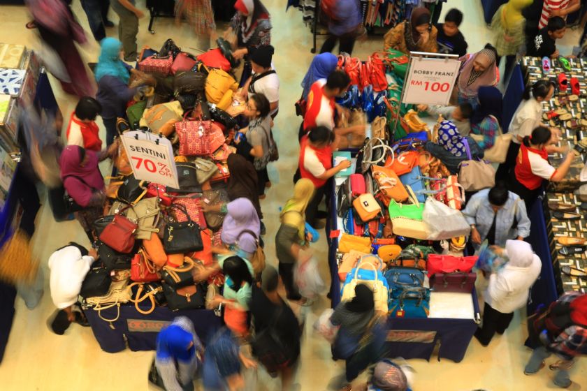 People taking advantage of the Boxing Day discounts go on a shopping spree at Sogo shopping centre in Kuala Lumpur, December 26, 2014. u00e2u20acu201dPicture by Saw Siow Feng