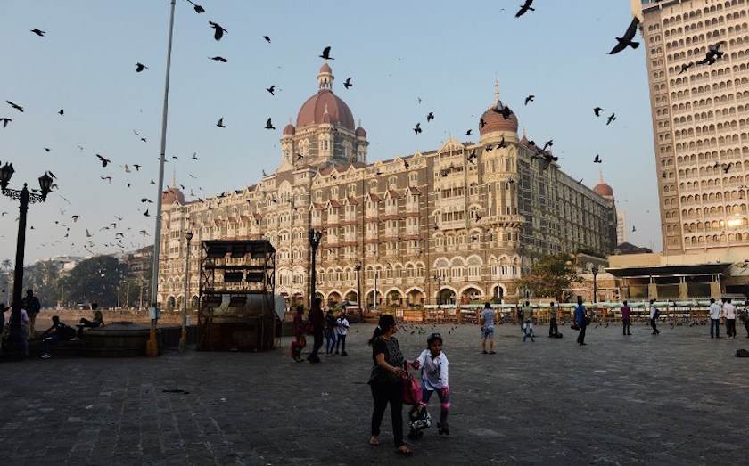 Indian children wait for the start of a skating rally at the promenade outside the Taj Mahal Palace hotel in Mumbai on November 26, 2014, in memory of those who lost their lives on the sixth anniversary of the November 2008 terror attacks. u00e2u20acu201d AFP pic