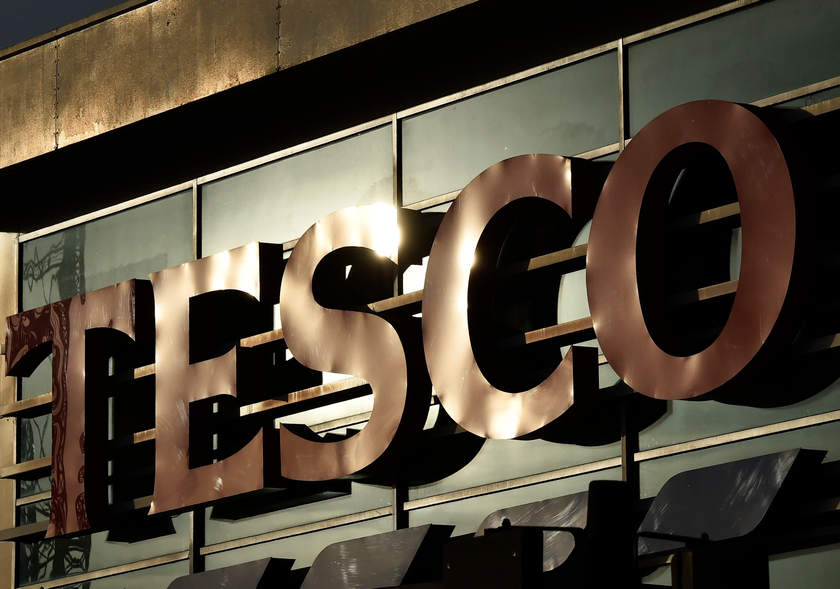 Signage is seen at a Tesco supermarket in central London, December 9, 2014. u00e2u20acu201d Reuters pic