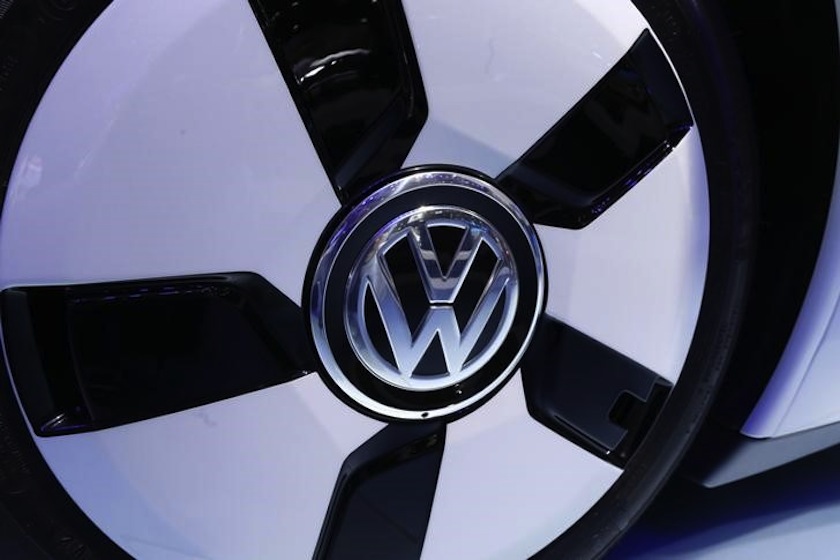 The VolksWagen logo is seen on their XL 1 car during the media day at the Paris Mondial de l'Automobile, October 3, 2014. u00e2u20acu201d Reuters pic
