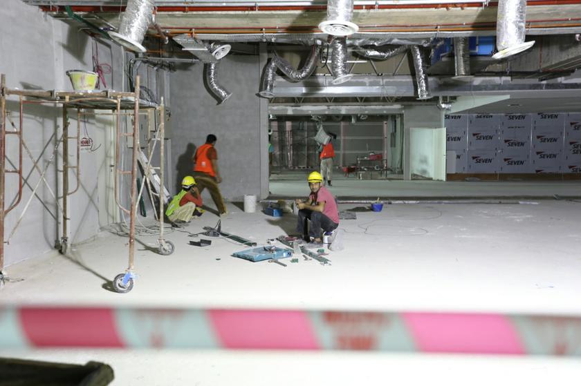 Construction workers are photographed at the low-cost carrier terminal KLIA2 in Sepang on January 7, 2014. u00e2u20acu201d Picture by Saw Siow Feng