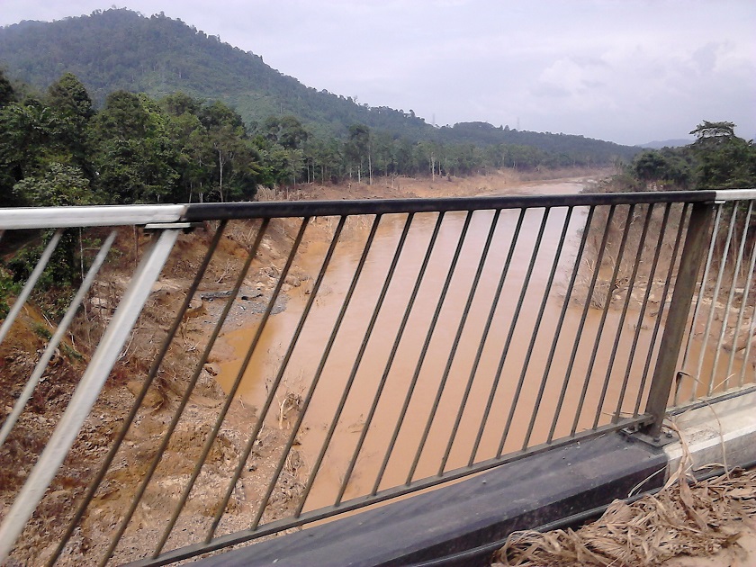 One of the many rivers criss-crossing Kuala Krai district. This one burst its banks and inundated nearby villagers in Manek Urai. — Picture by Jules Ong