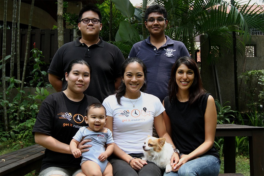 GoGet founder, Francesca Chia (centre), poses for a group photo with her team. — Picture by Yusof Mat Isa