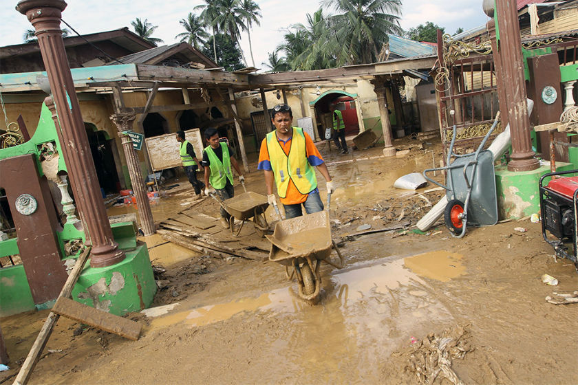 Cleaning up after the floods.