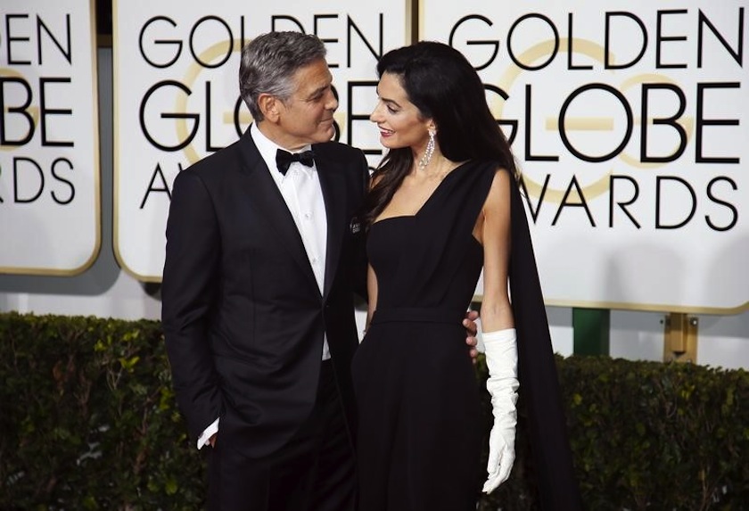 Actor George Clooney and wife, Amal Clooney, arrive at the 72nd Golden Globe Awards in Beverly Hills, California, January 11, 2015. — Reuters pic