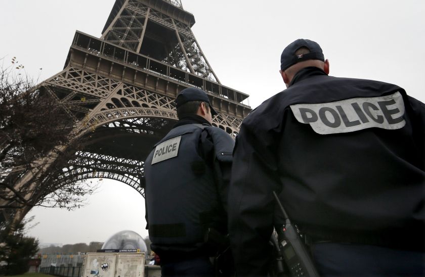 French police patrol near the Eiffel Tower in Paris as part of the highest level of 'Vigipirate' security plan after a shooting at the Paris offices of Charlie Hebdo January 7, 2015. ― Reuters pic