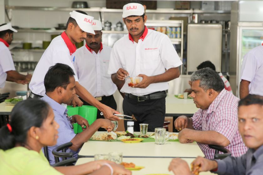 The banana leaf rice comes with fried chillies and achar.