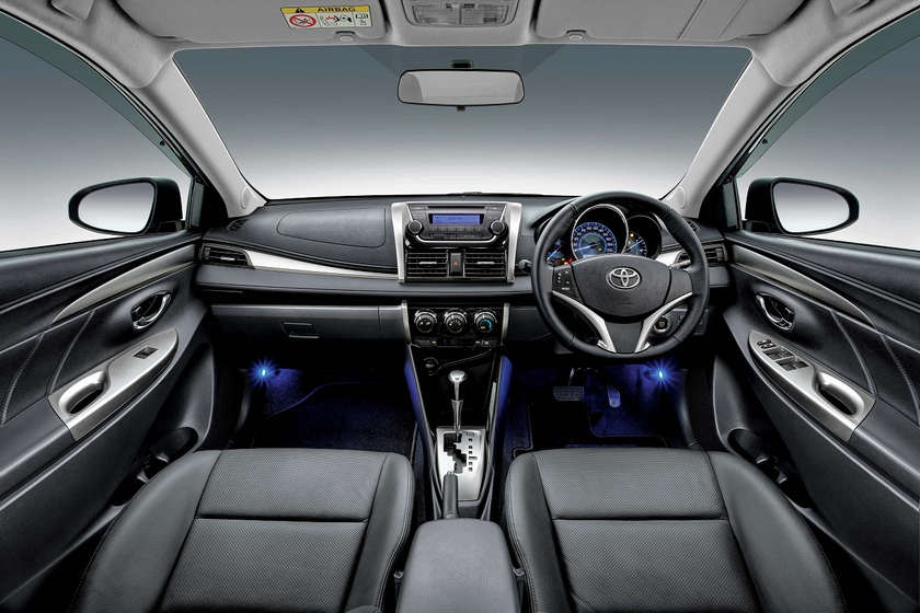 Vios 1.5G's black interior and blue front foot illumination. — Picture courtesy of UMW Toyota