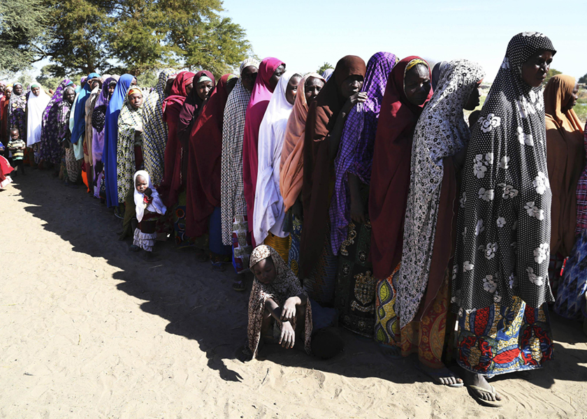 Women who have fled violence in Nigeria queue for food at a refugee welcoming center in Ngouboua, Chad, February 10, 2015. u00e2u20acu201d Reuters pic
