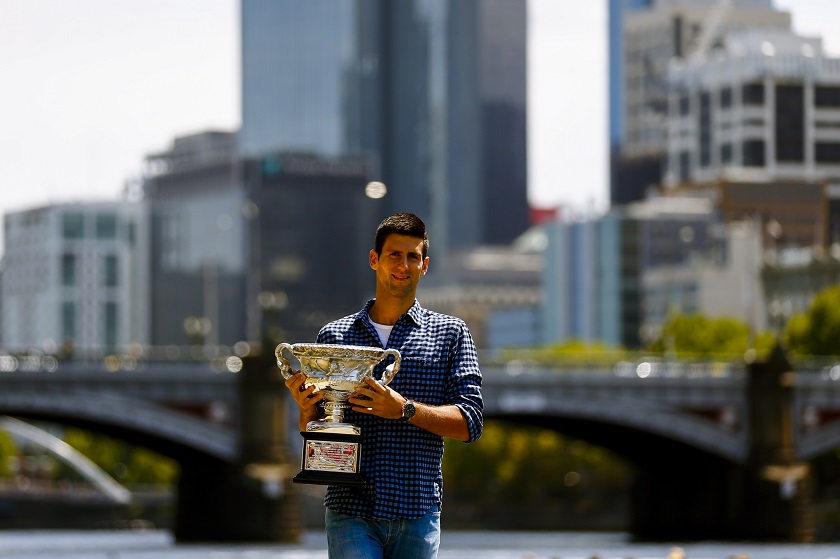 Novak Djokovic of Serbia poses with the Norman Brookes Challenge Cup on the banks of the Yarra River in Melbourne, February 2, 2015. u00e2u20acu201d Reuters pic