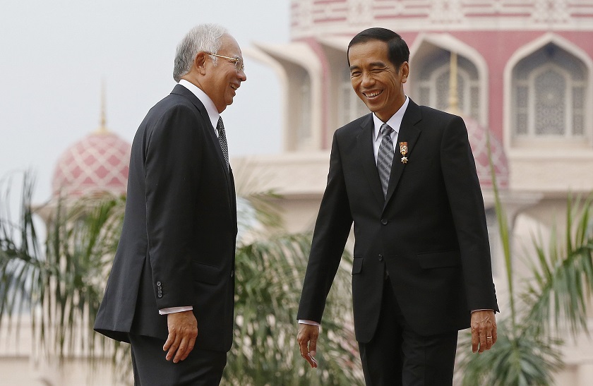 Malaysian Prime Minister Datuk Seri Najib Razak welcomes Indonesian President Joko Widodo (right) to the Prime Minister's Office in Putrajaya February 6, 2015. u00e2u20acu201d Reuters pic