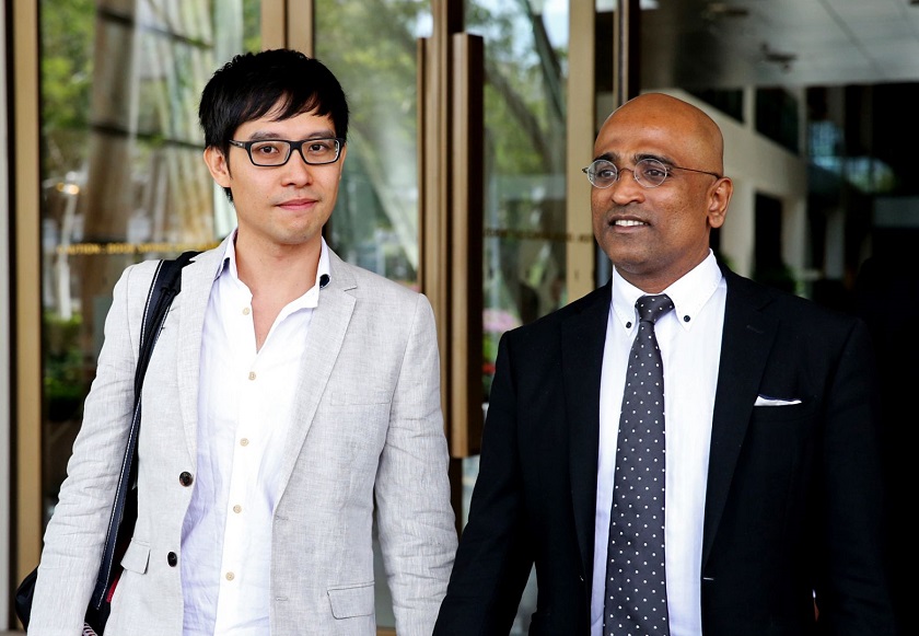 Blogger Roy Ngerng (left) leaving the Supreme Court with his lawyer M Ravi on Jan 12, 2015. u00e2u20acu201d Today pic