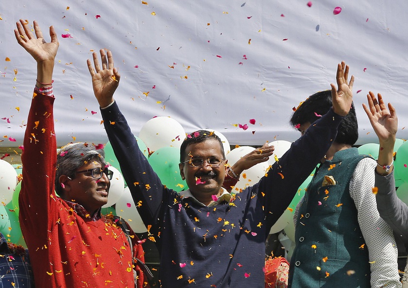 Aam Aadmi (Common Man) Party (AAP) chief and its chief ministerial candidate for Delhi, Arvind Kejriwal (centre) waves to his supporters in New Delhi February 10, 2015. u00e2u20acu201d Reuters pic