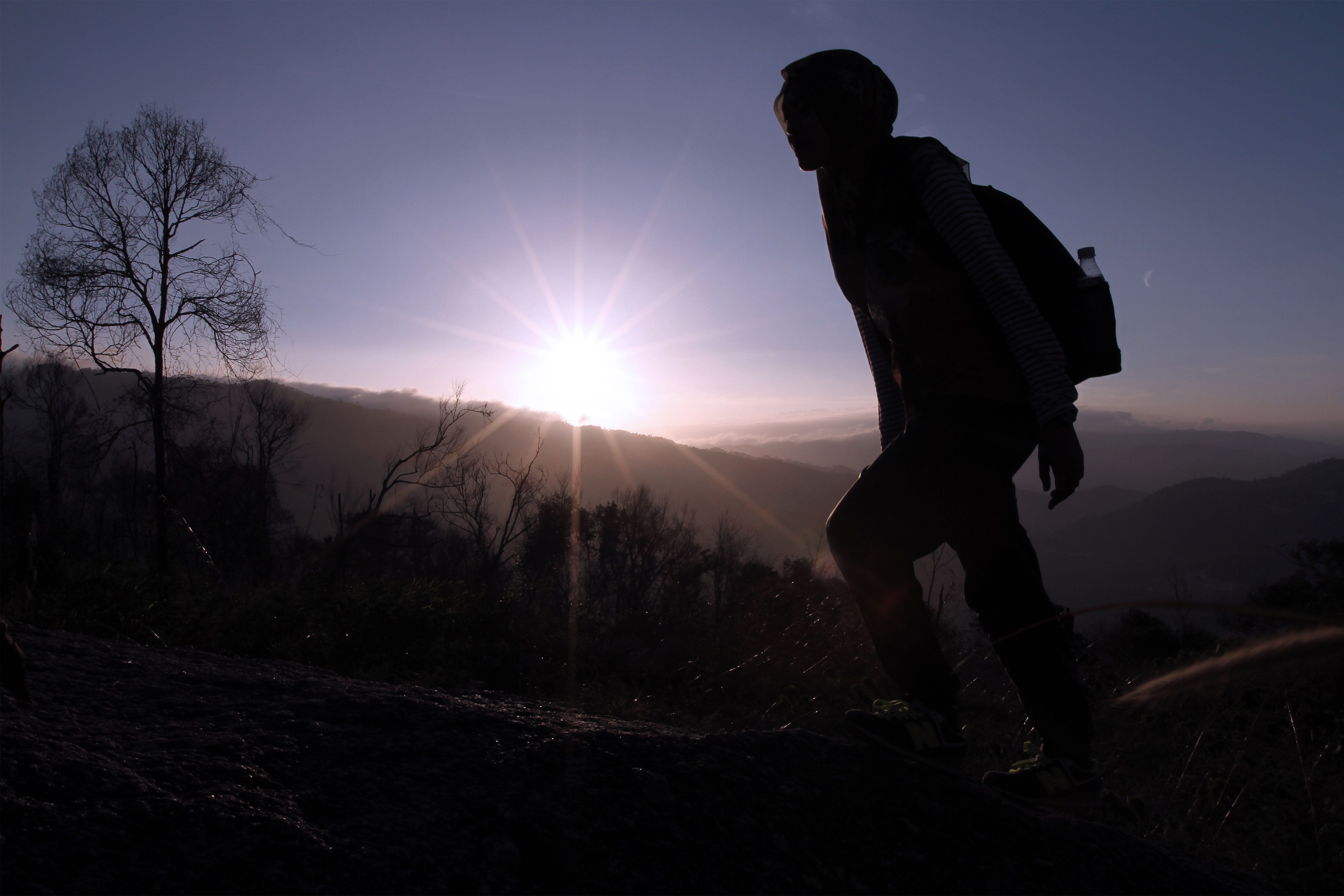 Silhouette of a woman at sunrise on Broga Hill in Semenyih, Selangor, February 8, 2015. u00e2u20acu201d Picture by Yusof Mat Isa