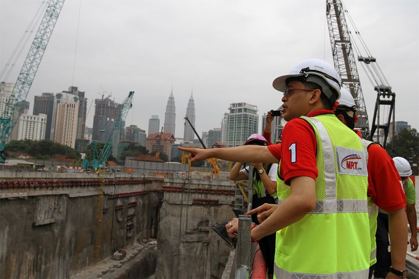 MRT Corp CEO Datou00e2u20acu2122 Sri Shahril Mokhtar examines ongoing construction work at Cochrane MRT station, Jalan Shelly, Kuala Lumpur, February 11, 2015. u00e2u20acu201d Picture by Yusof Mat Isa