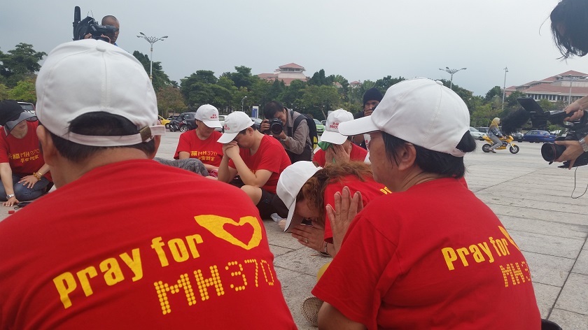 Families of Chinese passengers aboard missing Malaysia Airlines flight MH370 mourn the loss of their loved ones at a gathering in Putrajaya, February 18, 2015. u00e2u20acu201d Picture by Tzu Ging Yap