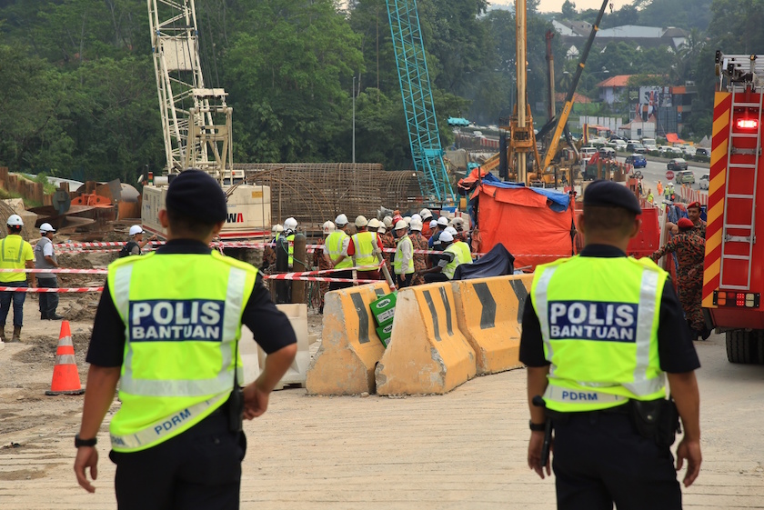 Police cordon off the MRT Semantan construction site following an accident in Kuala Lumpur February 27, 2015. u00e2u20acu201d Picture by Saw Siow Feng