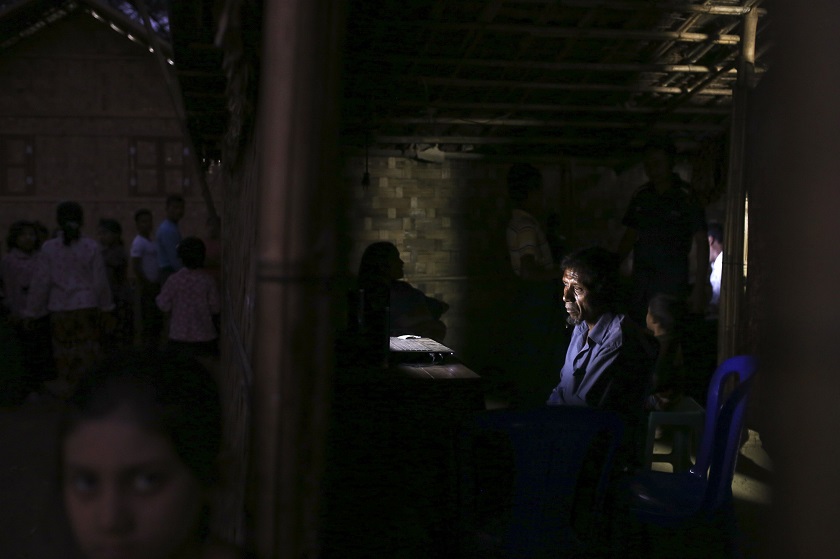 People gather in and around an internet hut in Thae Chaung village, home to thousands of displaced Rohingya Muslims near Sittwe, the capital of Rakhine State in western Myanmar, February 15, 2015. u00e2u20acu201d Reuters pic