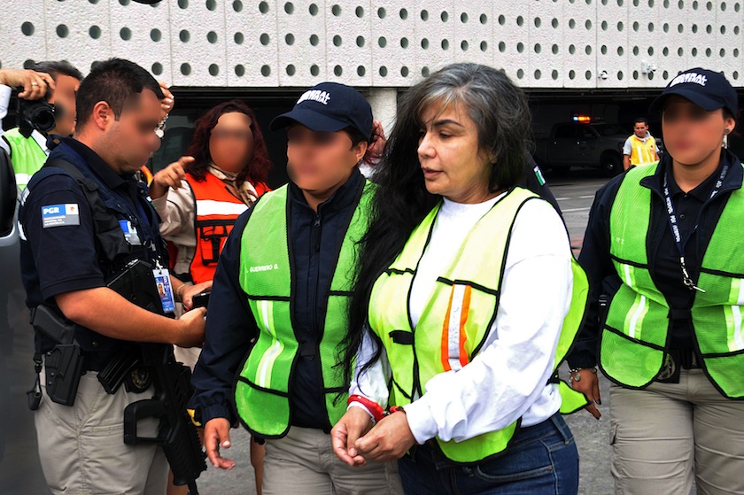 Handout photo released by the Prosecutor's Press Office showing Mexican Sandra Avila Beltran upon her arrival at the international airport in Mexico City on August 20, 2013. u00e2u20acu201d AFP pic