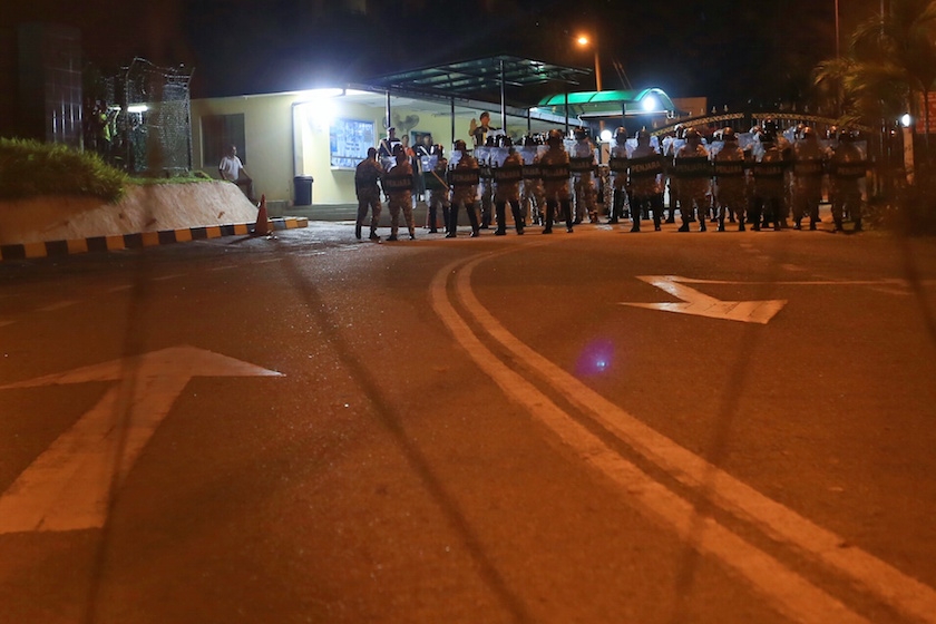 Prison officers stand outside the gates of the Sungai Buloh prison in Kuala Lumpur February 11, 2015. — Picture by Saw Siow Feng
