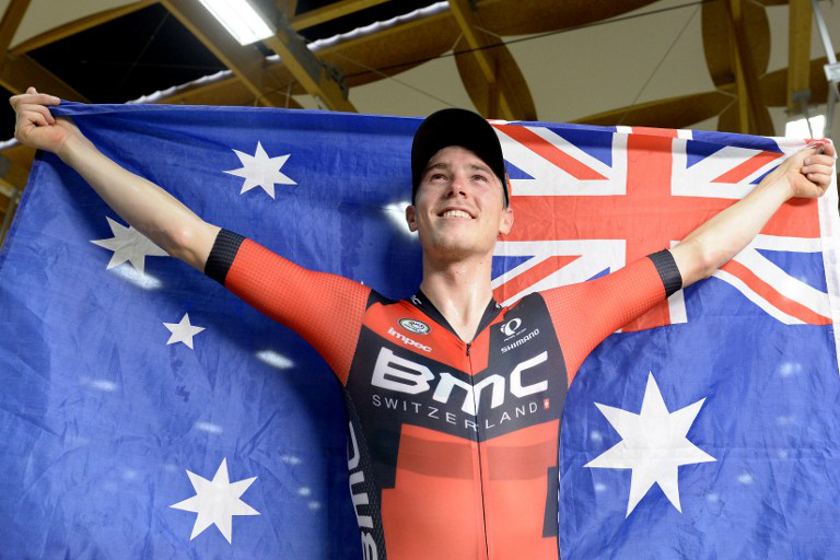 Australian cyclist Rohan Dennis poses after breaking the world hour record on February 8, 2015 at the Velodrome Suisse in Grenchen. u00e2u20acu201d AFP pic