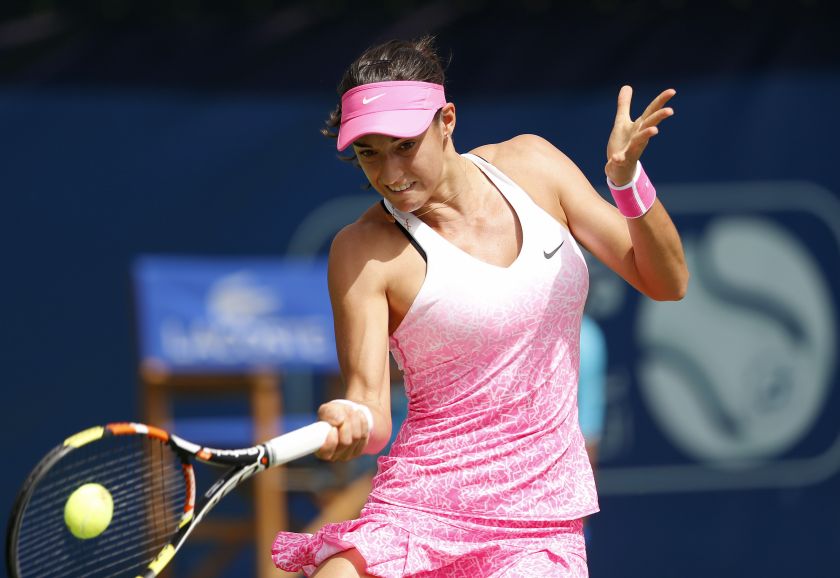 France's Caroline Garcia returns the ball to Poland's Agnieszka Radwanska during their women's singles tennis match at the WTA Dubai Tennis Championships February 17, 2015. u00e2u20acu201d Reuters pic