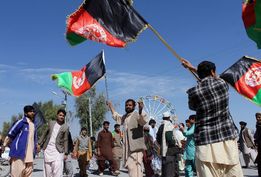 Afghan cricket fans in Kandahar province, February 26, 2015, celebrate their national cricket teamu00e2u20acu2122s victory in the World Cup 2015 match over Scotland. AFP PHOTO / Javed Tanveer
