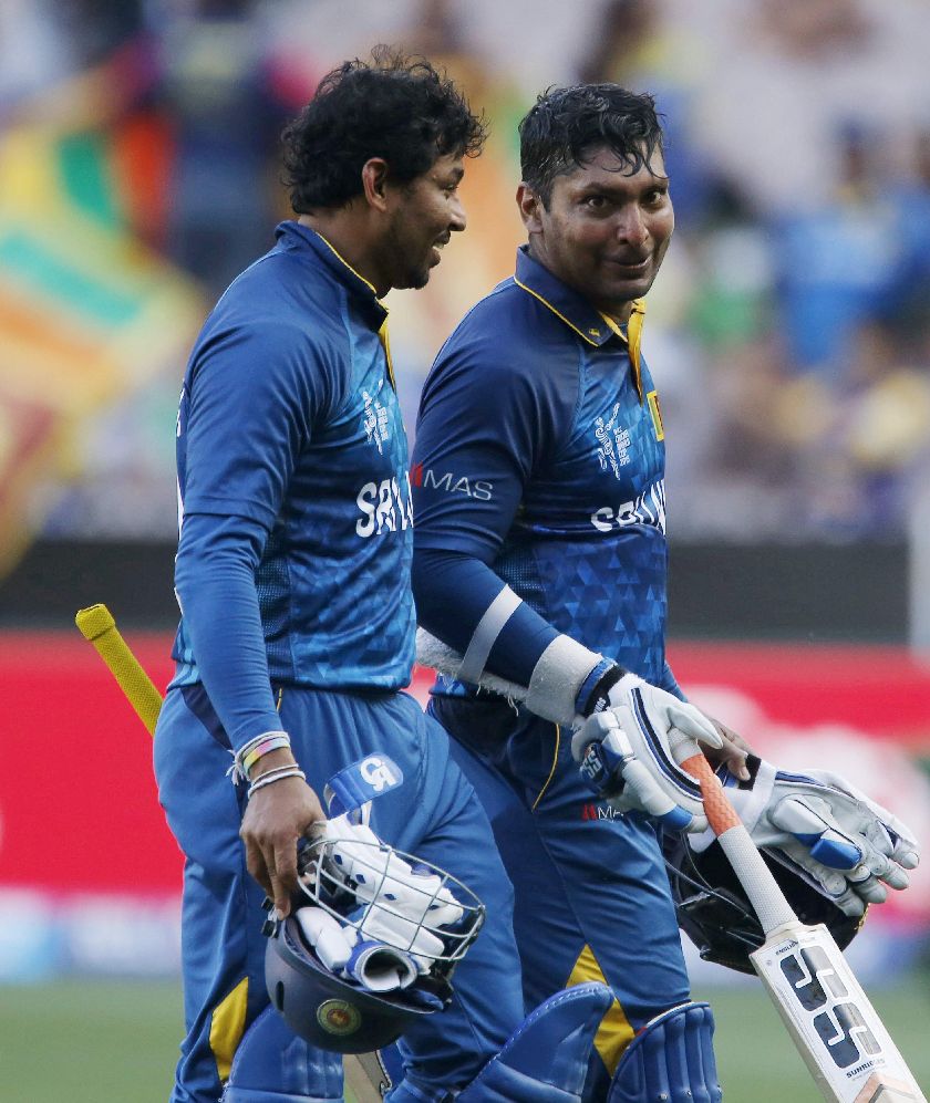 Centurions Tillakaratne Dilshan (left) and Kumar Sangakkara walk off at the end of their 50 overs sharing an unbroken partnership of 210 to set Sri Lanka up their win.
