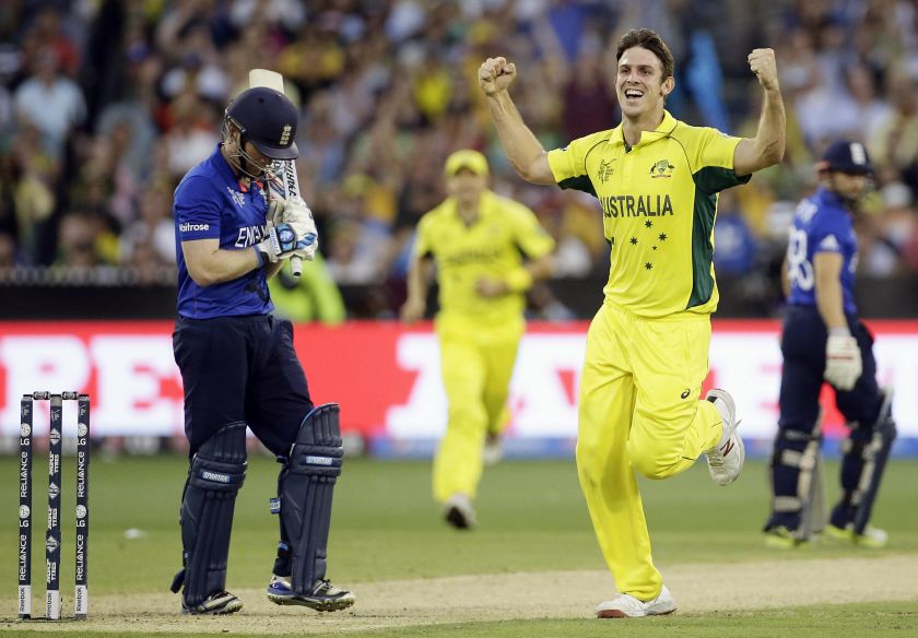 Australia's Mitchell Marsh (centre) celebrates dismissing England's captain Eoin Morgan (left) for a duck during their Cricket World Cup match at the Melbourne Cricket Ground (MCG) February 14, 2015. u00e2u20acu201d Reuters pic