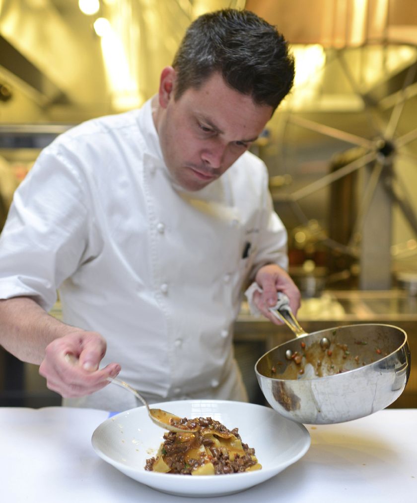 American chef Gavin Kaysen plates a lamb ragu dish in the kitchen of his restaurant Spoon and Stable in Minneapolis, Minnesota. REUTERS/Bonjwing Photograph/Handout 