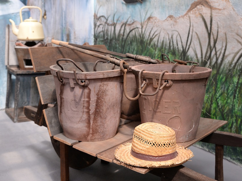 Rubber buckets containing real tin ore at Han Chin Pet Soo. 