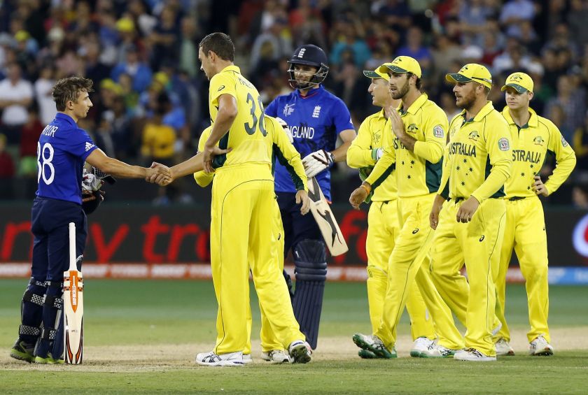 England's James Taylor (left) and team mate James Anderson (centre) shake hands with Australian players at the end of their Cricket World Cup match at the Melbourne Cricket Ground February 14, 2015. u00e2u20acu201d Reuters pic  